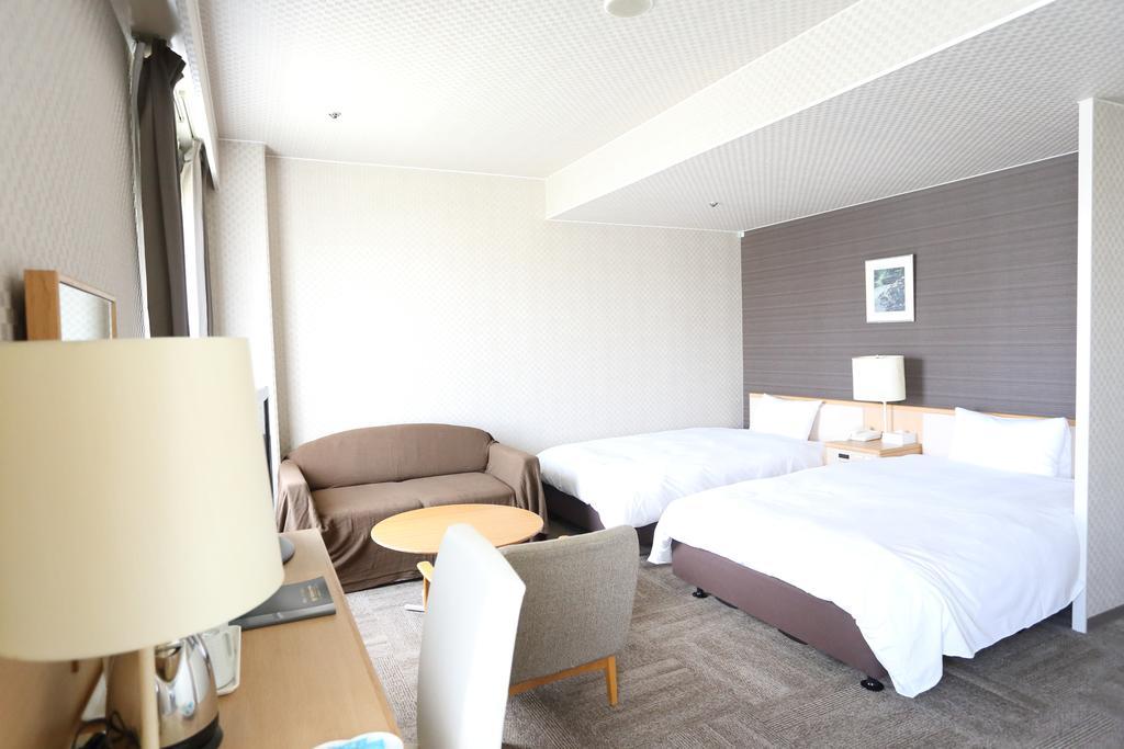 Hotel International House Ōsaka Zimmer foto